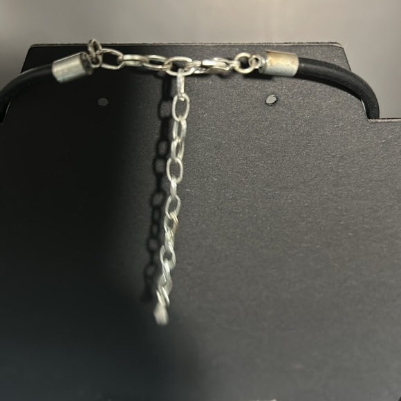 Silvertone sunburst necklace and earring set. Leather strap. - Picture 8 of 9